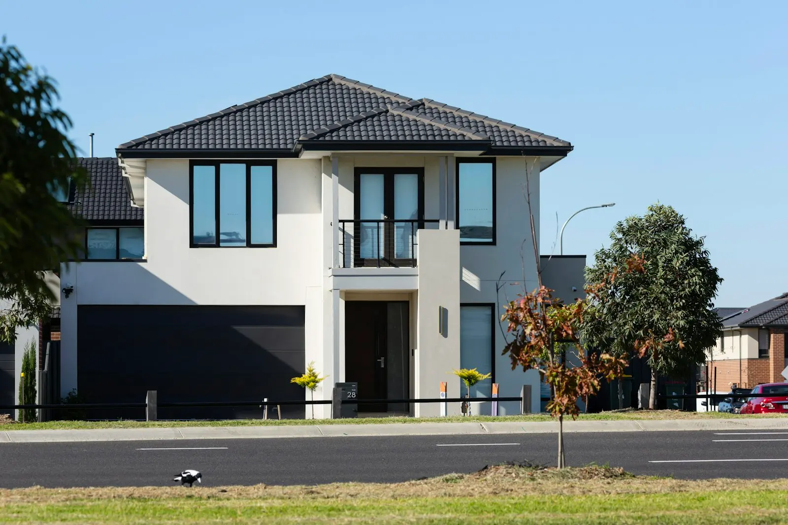 Modern two-story home with fresh charcoal roof